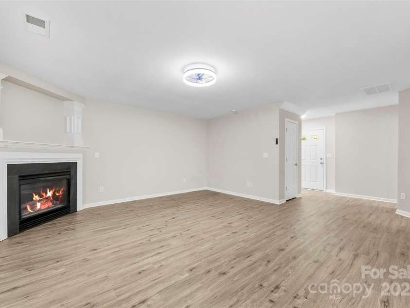 6340 Green Vista Court, Charlotte, NC 28212.  MLS# CAR4270399, YatesRealty ID 24343. Living Room with the Fireplace