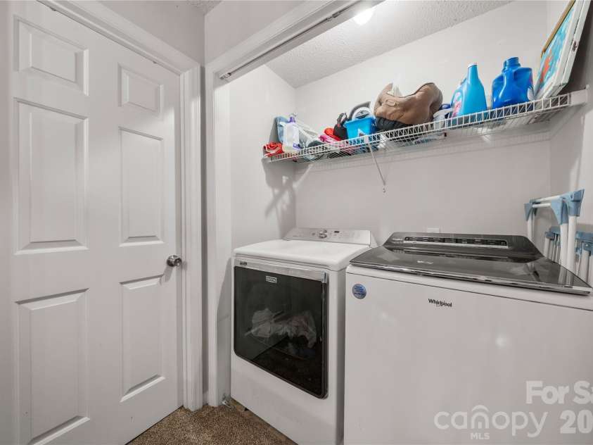 3072 Point Clear Drive, Tega Cay, SC 29708.  MLS# CAR4384137, YatesRealty ID 24351. Laundry upstairs between two bedrooms