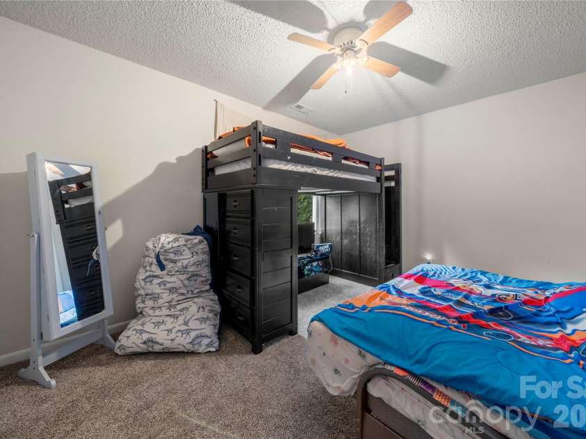 3072 Point Clear Drive, Tega Cay, SC 29708.  MLS# CAR4384137, YatesRealty ID 24351. Second upstairs bedroom