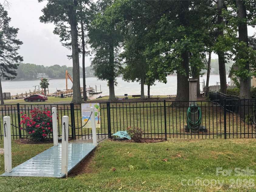 21205 Rio Oro Drive, Cornelius, NC 28031.  MLS# CAR4378603, YatesRealty ID 24353. Community lake access, keep you kayak or paddleboard here