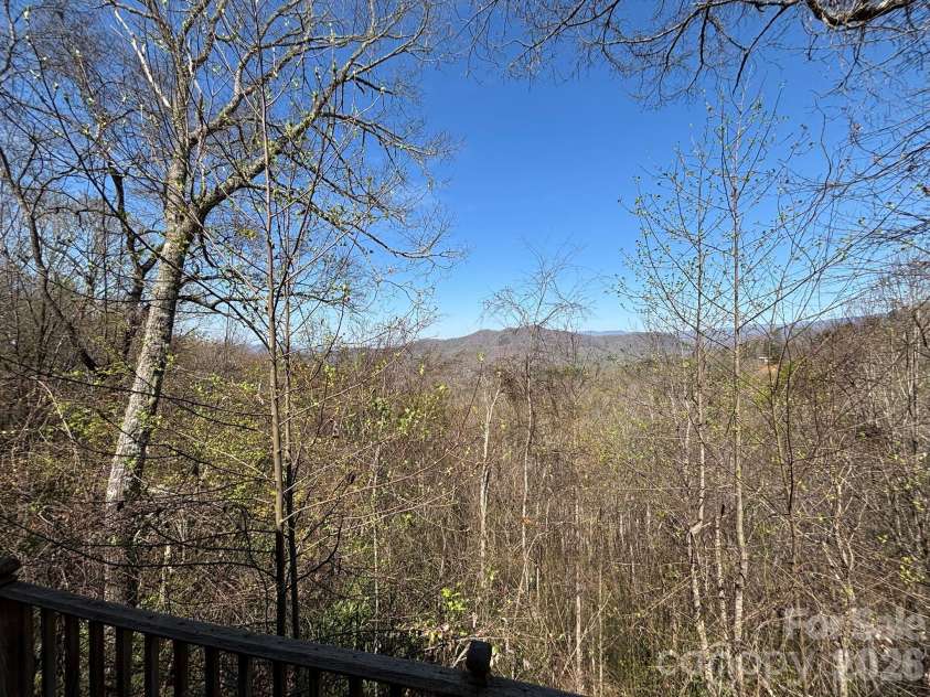 120 Kimberly Drive, Bryson City, NC 28713.  MLS# CAR4385063, YatesRealty ID 24356. Multiple viewing spots on the wrap deck.