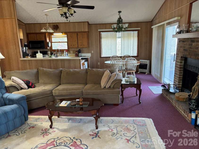 120 Kimberly Drive, Bryson City, NC 28713.  MLS# CAR4385063, YatesRealty ID 24356. Open concept living/dining/kitchen.