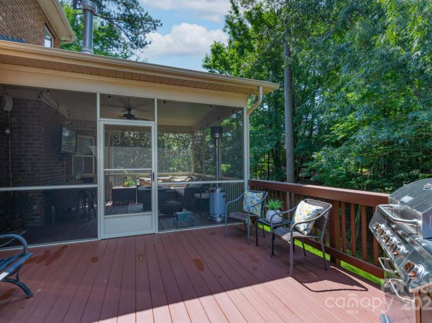 303 Ridge Reserve Drive, Clover, SC 29710.  MLS# CAR4232710, YatesRealty ID 24358. Cozy and private screened back porch and deck