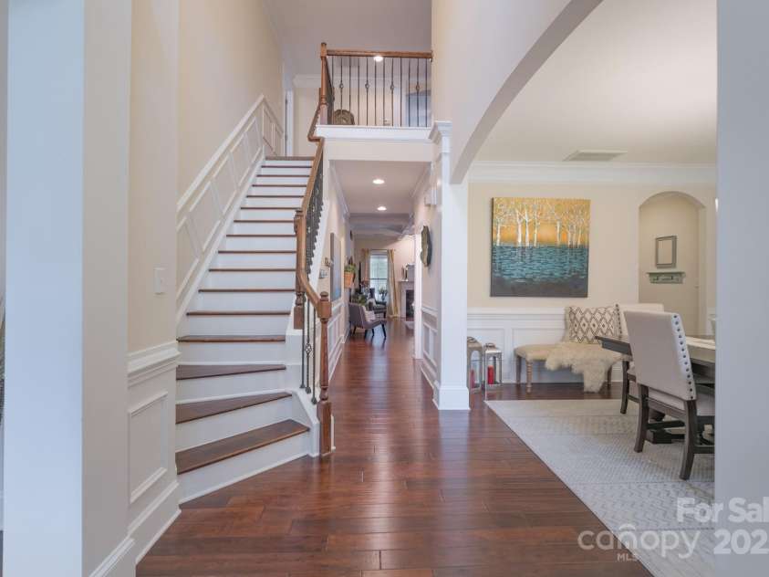 303 Ridge Reserve Drive, Clover, SC 29710.  MLS# CAR4232710, YatesRealty ID 24358. Exquisite details throughout the house as seen in the elegant staircase leading to the upper level.