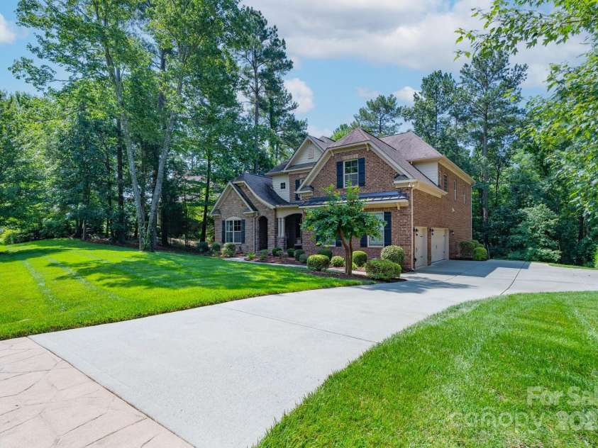 303 Ridge Reserve Drive, Clover, SC 29710.  MLS# CAR4232710, YatesRealty ID 24358. Extensive driveway that leads to the 3-car garage