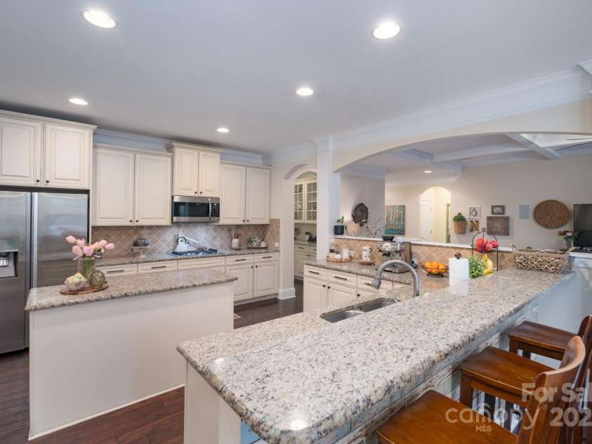 303 Ridge Reserve Drive, Clover, SC 29710.  MLS# CAR4232710, YatesRealty ID 24358. Gourmet kitchen with island, gas cooktop, double wall ovens and pantry!