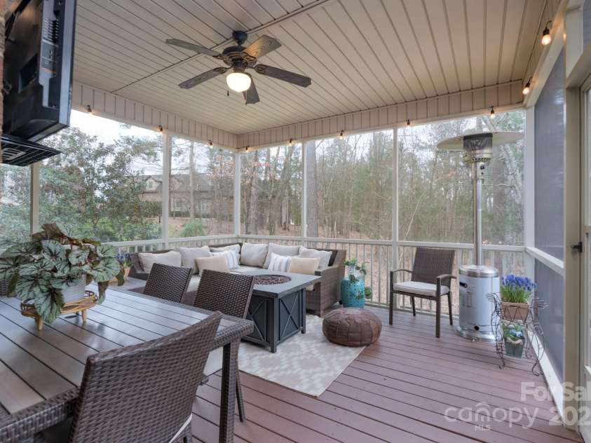 303 Ridge Reserve Drive, Clover, SC 29710.  MLS# CAR4232710, YatesRealty ID 24358. Serene and private screened back porch perfect for entertaining with family & friends!