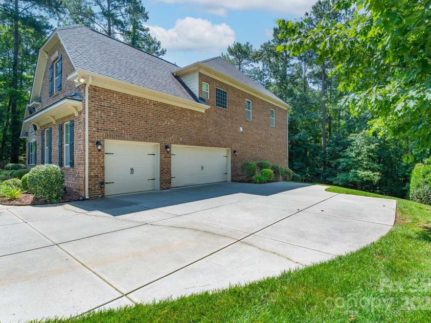 303 Ridge Reserve Drive, Clover, SC 29710.  MLS# CAR4232710, YatesRealty ID 24358. Three car-garage and extensive driveway