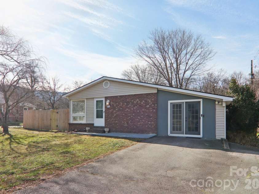 591 Blue Ridge Road, Black Mountain, NC 28711.  MLS# CAR4320573, YatesRealty ID 2436. Ample parking and level yard
