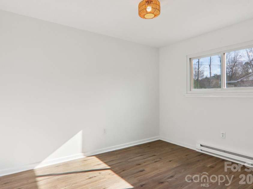591 Blue Ridge Road, Black Mountain, NC 28711.  MLS# CAR4320573, YatesRealty ID 2436. Bedroom 3