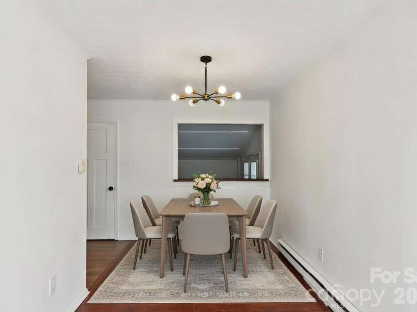 591 Blue Ridge Road, Black Mountain, NC 28711.  MLS# CAR4320573, YatesRealty ID 2436. Dining nook, pass through to bonus room,  Virtually staged