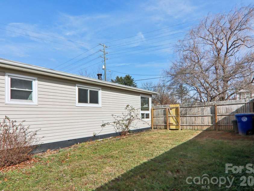 591 Blue Ridge Road, Black Mountain, NC 28711.  MLS# CAR4320573, YatesRealty ID 2436. Fenced side yard