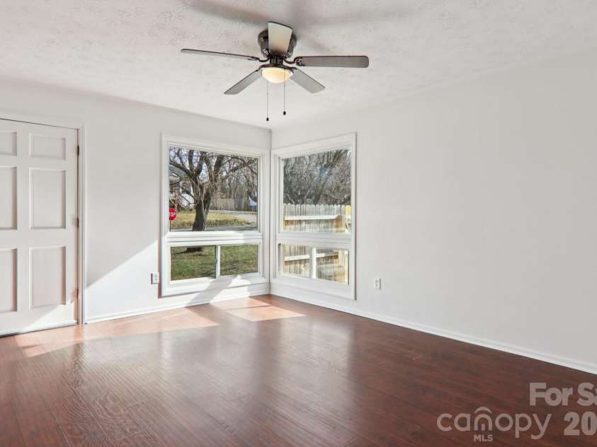 591 Blue Ridge Road, Black Mountain, NC 28711.  MLS# CAR4320573, YatesRealty ID 2436. Living area looking towards front and side yard