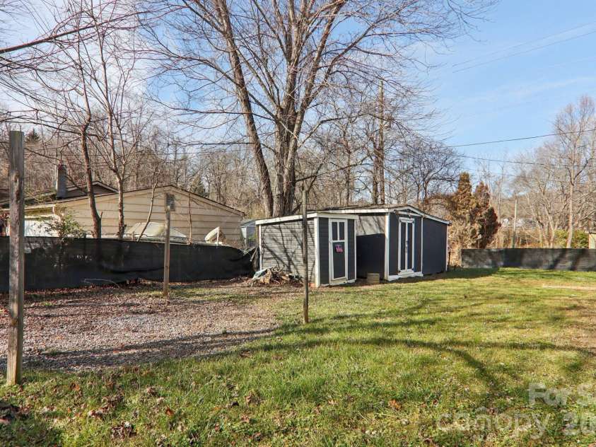 591 Blue Ridge Road, Black Mountain, NC 28711.  MLS# CAR4320573, YatesRealty ID 2436. Rear level yard
