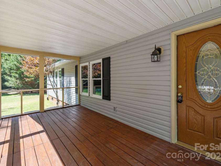 7011 Providence Road, Waxhaw, NC 28173.  MLS# CAR4271791, YatesRealty ID 24363. Screened Front Porch