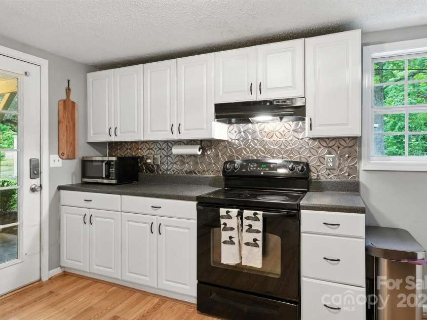 147 Mink Farm Road, Leicester, NC 28748.  MLS# CAR4276189, YatesRealty ID 24366. All Appliances Convey