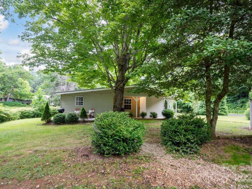 147 Mink Farm Road, Leicester, NC 28748.  MLS# CAR4276189, YatesRealty ID 24366. Beautiful Trees on Property