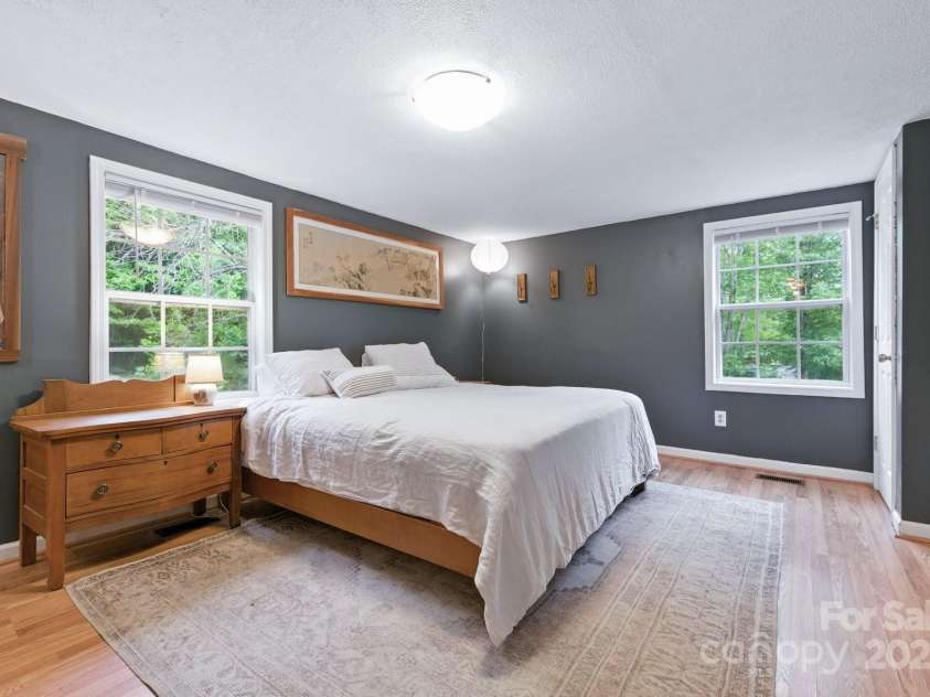 147 Mink Farm Road, Leicester, NC 28748.  MLS# CAR4276189, YatesRealty ID 24366. Private Primary Suite