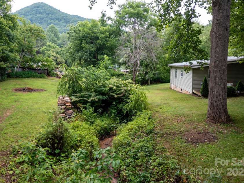 147 Mink Farm Road, Leicester, NC 28748.  MLS# CAR4276189, YatesRealty ID 24366. Surrounded by Nature