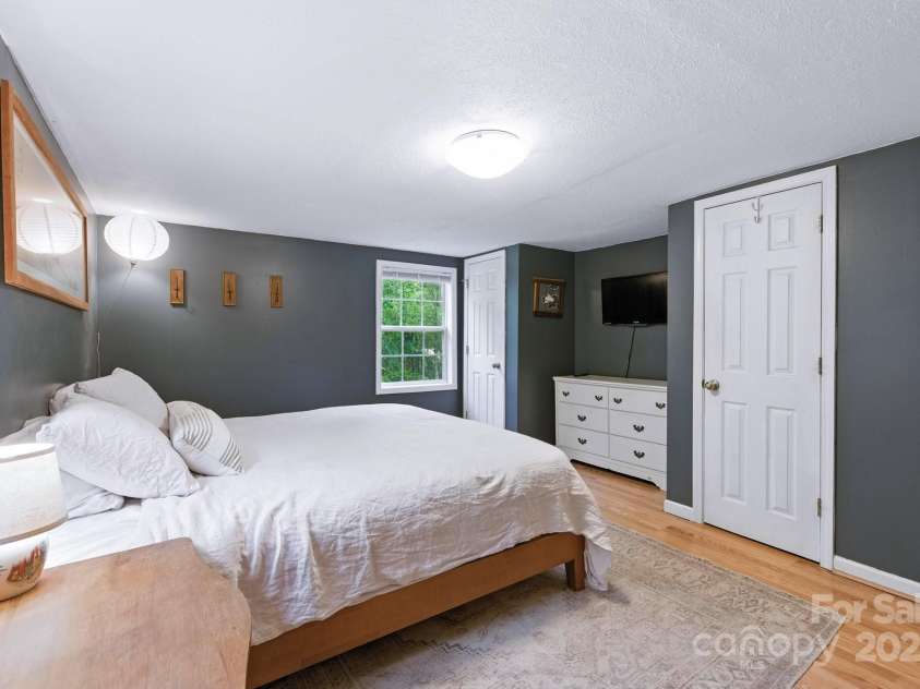 147 Mink Farm Road, Leicester, NC 28748.  MLS# CAR4276189, YatesRealty ID 24366. TV/Dresser Nook and Two Closets