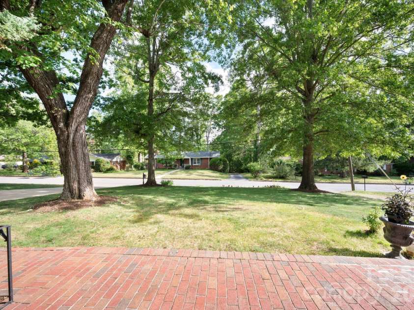 25 Bevlyn Drive, Asheville, NC 28803.  MLS# CAR4383136, YatesRealty ID 24366. Pretty yard views from the front