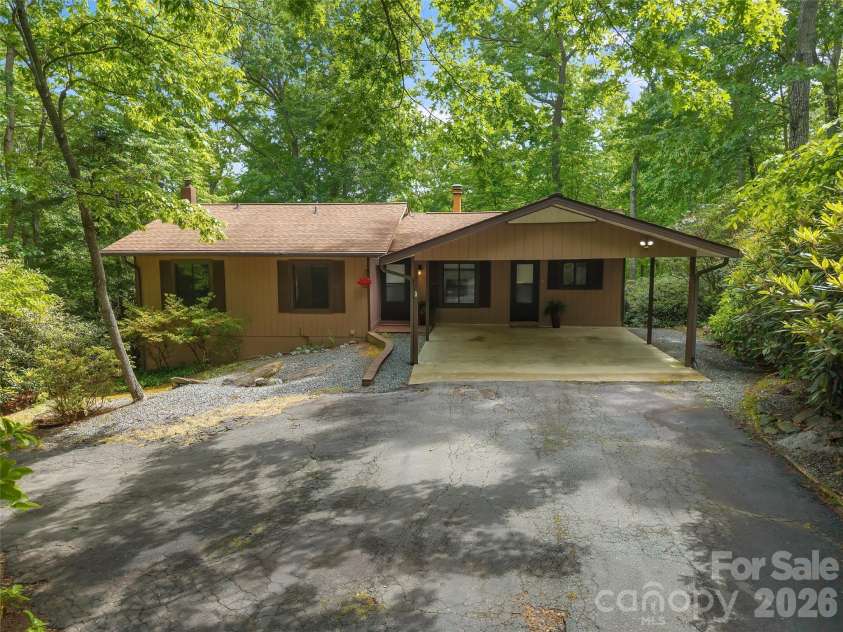 32 Honeysuckle Ridge Road, Pisgah Forest, NC 28768.  MLS# CAR4383495, YatesRealty ID 24367. 