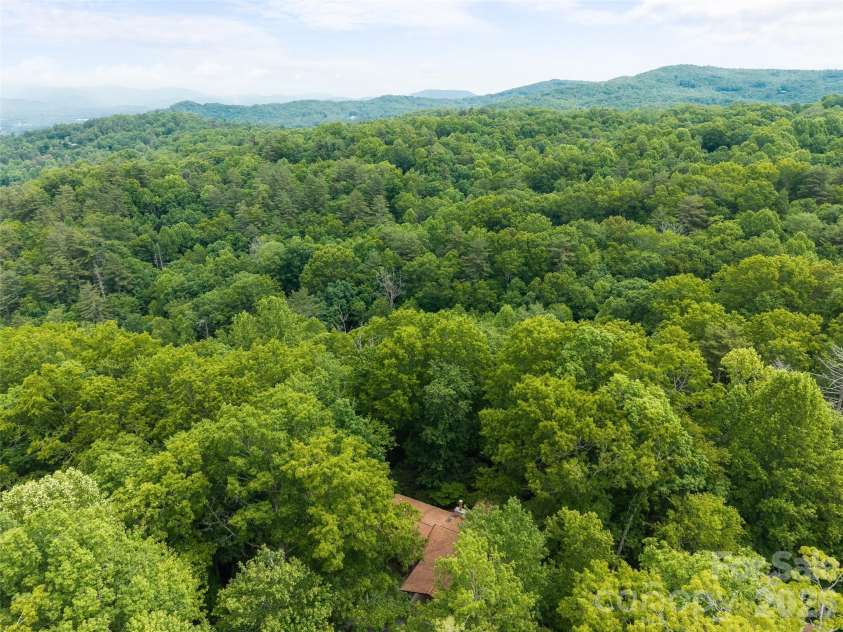 32 Honeysuckle Ridge Road, Pisgah Forest, NC 28768.  MLS# CAR4383495, YatesRealty ID 24367. 