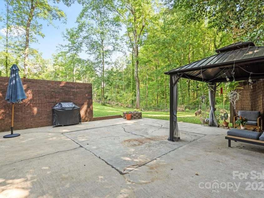 4322 Greenhaven Lane, Gastonia, NC 28056.  MLS# CAR4275148, YatesRealty ID 24369. Basement Walkout/Pergola