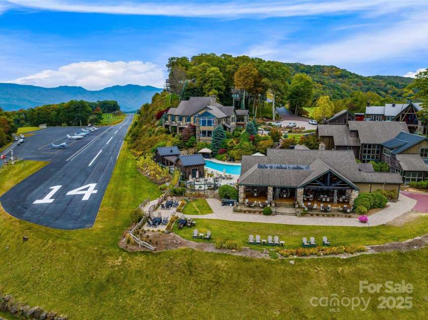 616 Old Growth Forest Road, Burnsville, NC 28714.  MLS# CAR4076276, YatesRealty ID 2437. Fly in Fly Out community - Mountain Air has a Private run way that has the highest elevation run way east of the Missisippi
