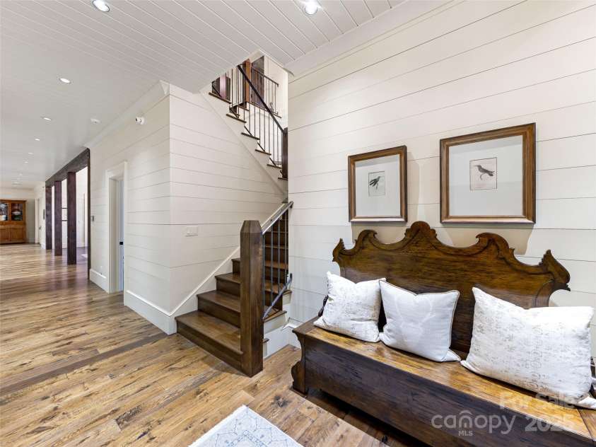 616 Old Growth Forest Road, Burnsville, NC 28714.  MLS# CAR4076276, YatesRealty ID 2437. ...perhaps you prefer to take the stairs to the Upper Level