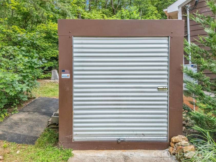 479 Camp Hill Road, Lake Lure, NC 28756.  MLS# CAR4384895, YatesRealty ID 24371. Additional storage container