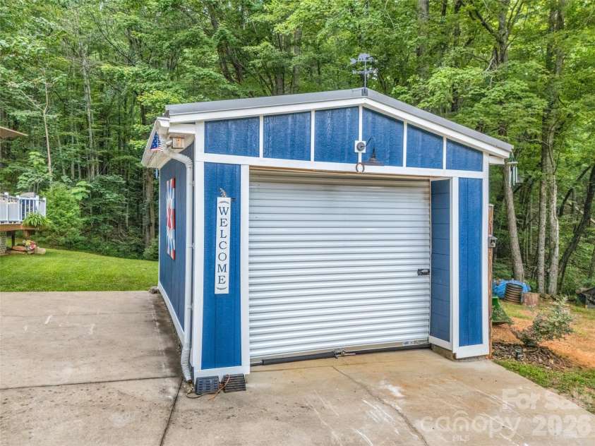 479 Camp Hill Road, Lake Lure, NC 28756.  MLS# CAR4384895, YatesRealty ID 24371. Garage with ample storage