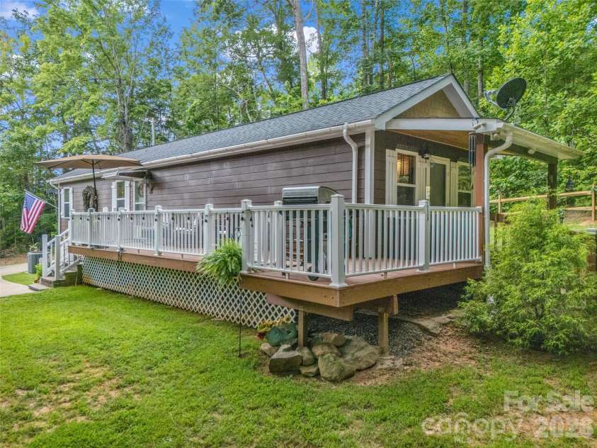 479 Camp Hill Road, Lake Lure, NC 28756.  MLS# CAR4384895, YatesRealty ID 24371. Large deck to enjoy those quiet evenings