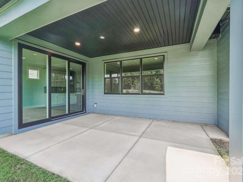 612 Hyder Trail, Tega Cay, SC 29708.  MLS# CAR4266465, YatesRealty ID 24372. Covered patio