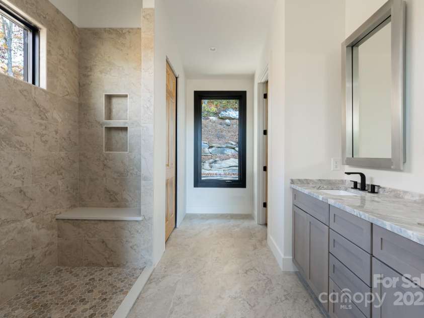 52 Hidden Grouse Lane, Sapphire, NC 28774.  MLS# CAR4276795, YatesRealty ID 24374. 