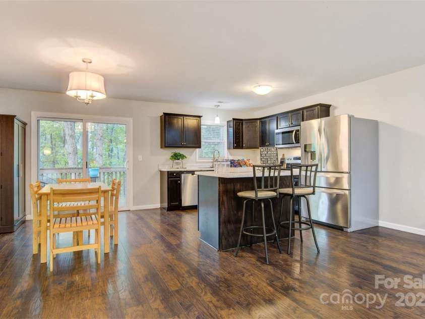 2835 24TH STREET Drive, Hickory, NC 28601.  MLS# CAR4251090, YatesRealty ID 24377. LIVING AREA SHOWING STAIRS AND FRONT DOOR