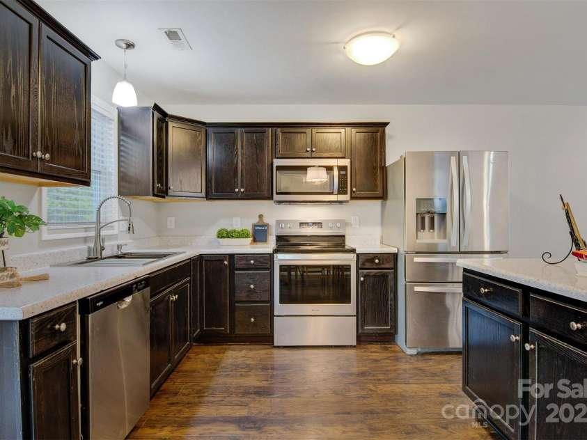 2835 24TH STREET Drive, Hickory, NC 28601.  MLS# CAR4251090, YatesRealty ID 24377. LIVING ROOM LOOKING FROM KITCHEN