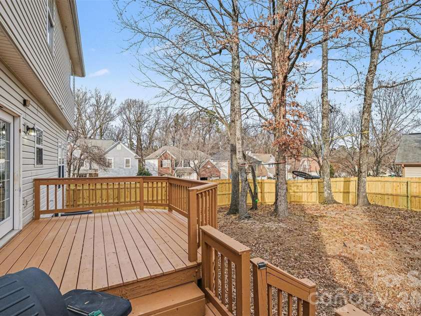 6603 Allness Glen Lane, Charlotte, NC 28269.  MLS# CAR4333202, YatesRealty ID 2438. Backyard & Deck