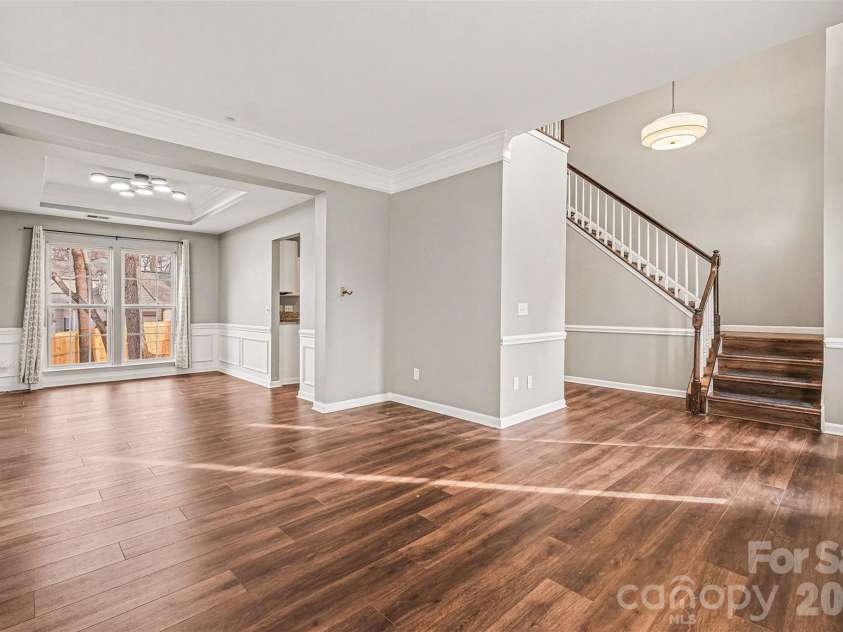6603 Allness Glen Lane, Charlotte, NC 28269.  MLS# CAR4333202, YatesRealty ID 2438. Formal Living Room into Dining Room