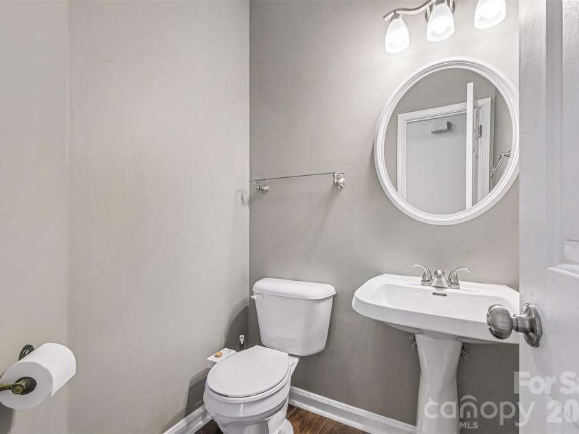 6603 Allness Glen Lane, Charlotte, NC 28269.  MLS# CAR4333202, YatesRealty ID 2438. Main level half bath