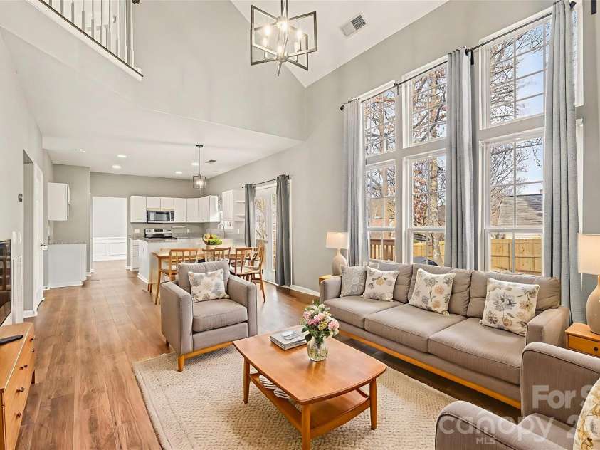 6603 Allness Glen Lane, Charlotte, NC 28269.  MLS# CAR4333202, YatesRealty ID 2438. Open Great Room into Dining area & kitchen *Virtually Staged*