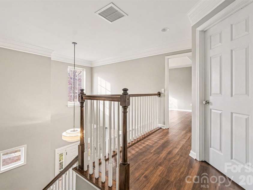 6603 Allness Glen Lane, Charlotte, NC 28269.  MLS# CAR4333202, YatesRealty ID 2438. Second level hallway