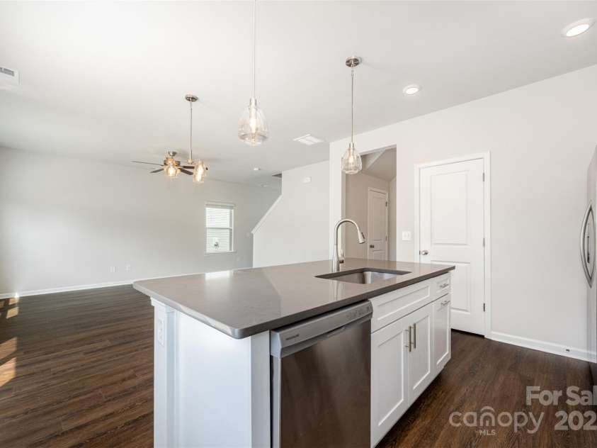 1209 Cathey Road, Charlotte, NC 28214.  MLS# CAR4275202, YatesRealty ID 24380. Gorgeous, quartz island. Representational Photo