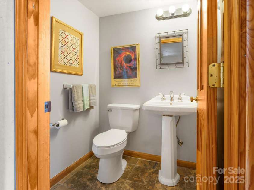 2981 Heath Peak Road, Waynesville, NC 28785.  MLS# CAR4266854, YatesRealty ID 24381. Basement 1/2 bath