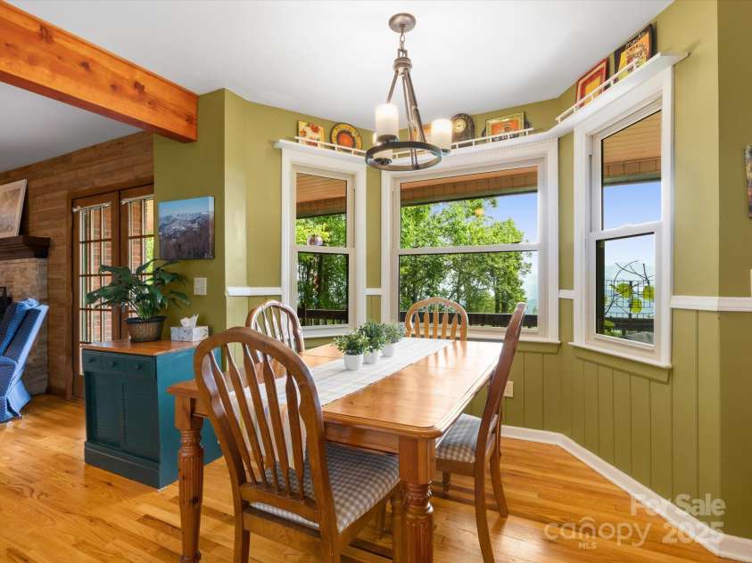 2981 Heath Peak Road, Waynesville, NC 28785.  MLS# CAR4266854, YatesRealty ID 24381. Beautiful views from the informal dining area