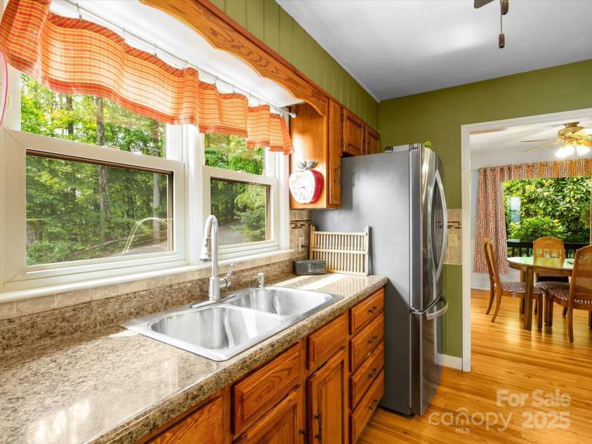 2981 Heath Peak Road, Waynesville, NC 28785.  MLS# CAR4266854, YatesRealty ID 24381. Extra wide kitchen window over the sink
