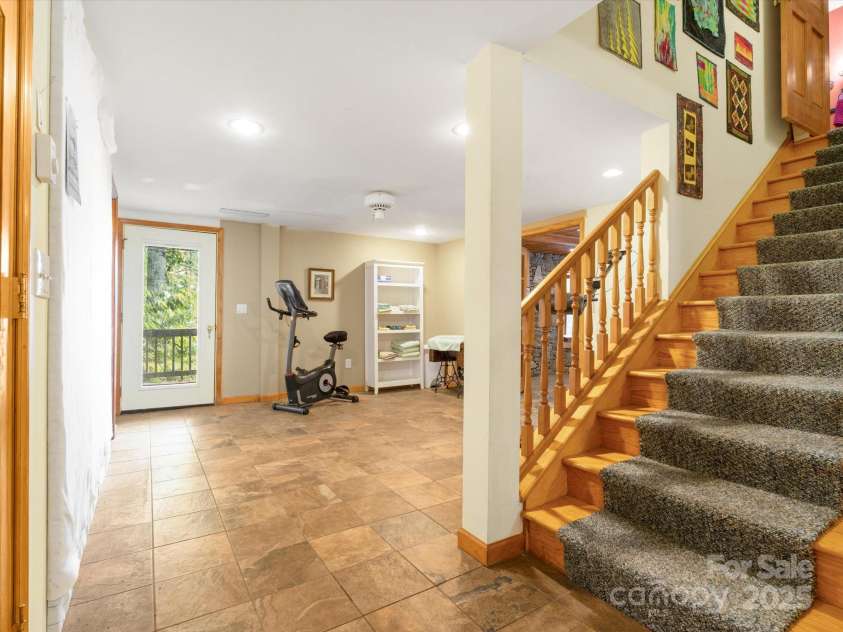 2981 Heath Peak Road, Waynesville, NC 28785.  MLS# CAR4266854, YatesRealty ID 24381. Interior entry to basement