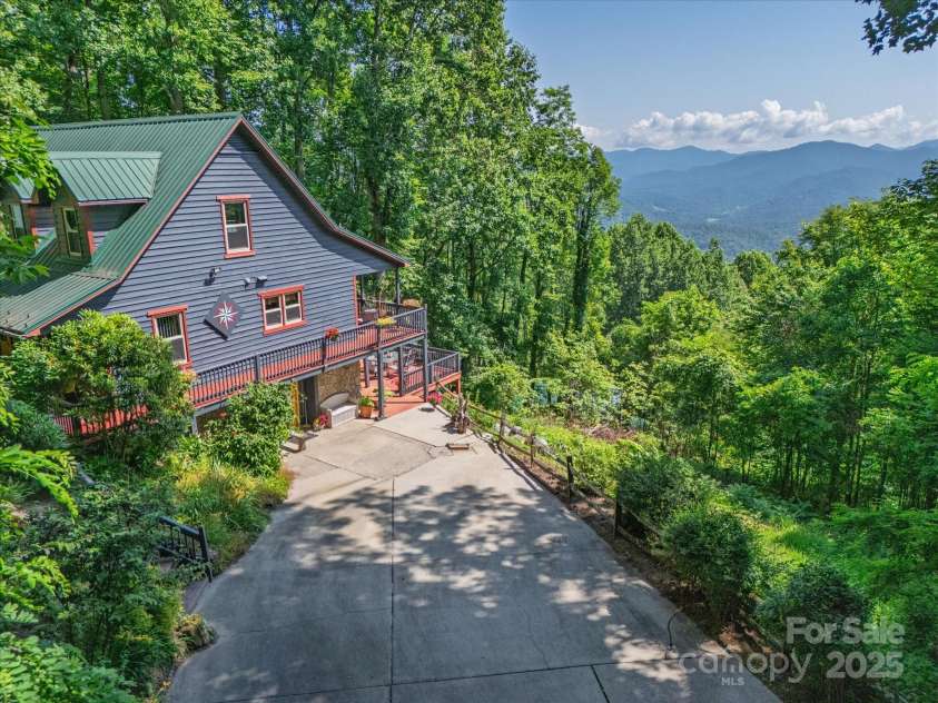 2981 Heath Peak Road, Waynesville, NC 28785.  MLS# CAR4266854, YatesRealty ID 24381. Look at this views! They are even bigger in the winter.