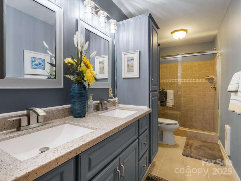 2981 Heath Peak Road, Waynesville, NC 28785.  MLS# CAR4266854, YatesRealty ID 24381. Plenty of storage and tiled walk-in shower