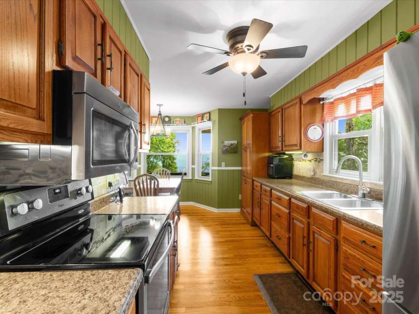 2981 Heath Peak Road, Waynesville, NC 28785.  MLS# CAR4266854, YatesRealty ID 24381. Spacious kitchen with ample storage